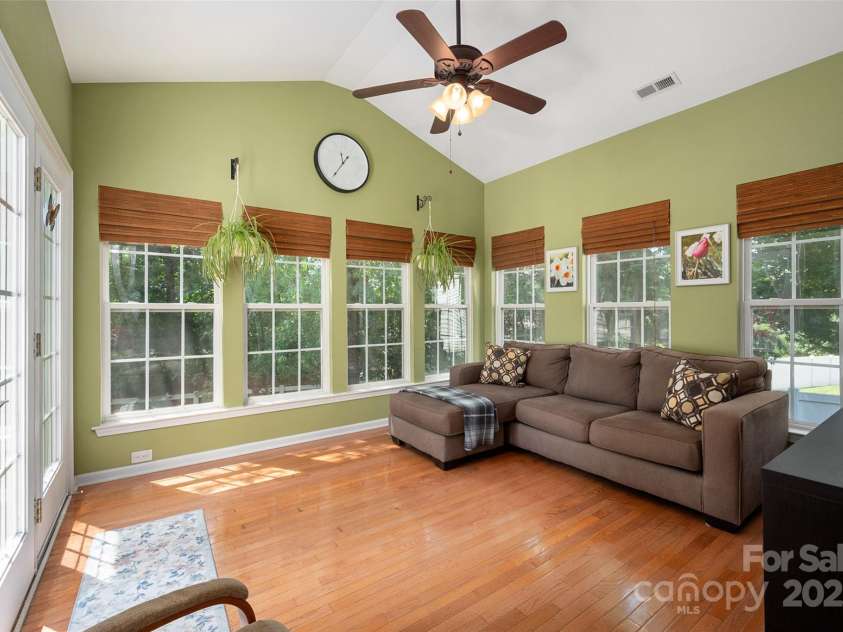 512 Veloce Trail, Fort Mill, SC 29715.  MLS# CAR4274741, YatesRealty ID 22407. Sunroom w/abundance of natural light overlooking the private backyard
