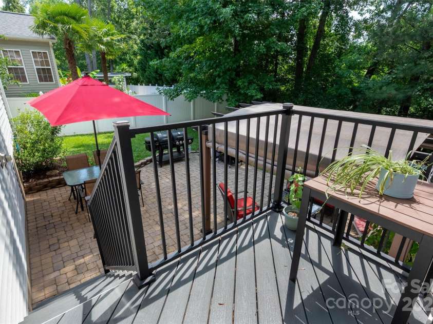 512 Veloce Trail, Fort Mill, SC 29715.  MLS# CAR4274741, YatesRealty ID 22407. Trex deck overlooking patio and fully fenced backyard