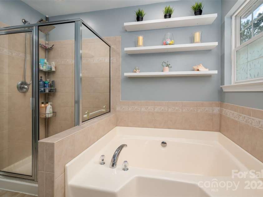 512 Veloce Trail, Fort Mill, SC 29715.  MLS# CAR4274741, YatesRealty ID 22407. Updated primary bathrom w/garden tub and dual sink vanity