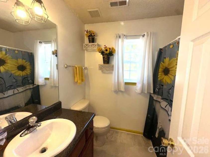 402 Trillium Court, Conover, NC 28613.  MLS# CAR4379930, YatesRealty ID 22408. Hall bath