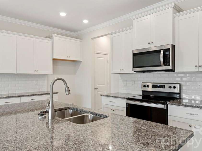 384 Creekview Road, Hendersonville, NC 28792.  MLS# CAR4336728, YatesRealty ID 2241. Photos are representative