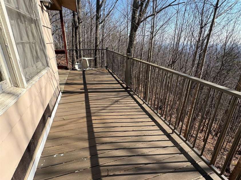 700 Summit Road, Tryon, NC 28782.  MLS# CAR4344125, YatesRealty ID 2241. Deck was replaced fairly recently with railings, framing and synthetic decking.