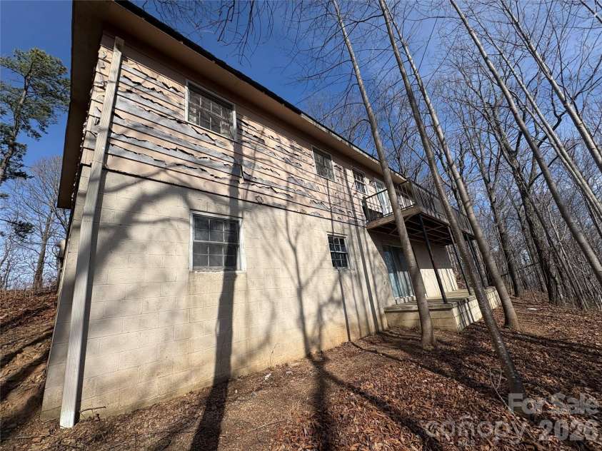 700 Summit Road, Tryon, NC 28782.  MLS# CAR4344125, YatesRealty ID 2241. Lower level is 1000 sf with high ceilings. 