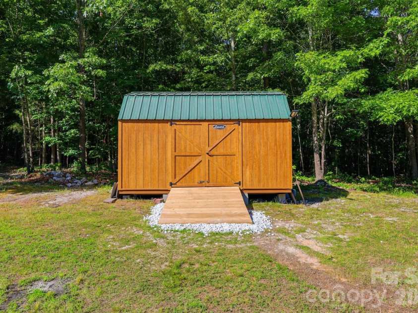 4344 Walker Road, Rock Hill, SC 29730.  MLS# CAR4382212, YatesRealty ID 22410. Large shed that stays for additional storage!