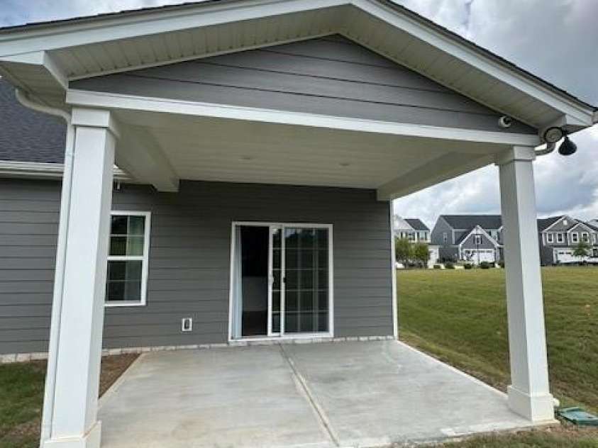 1411 Cottage Green Drive, Monroe, NC 28112.  MLS# CAR4275637, YatesRealty ID 22414. Back patio