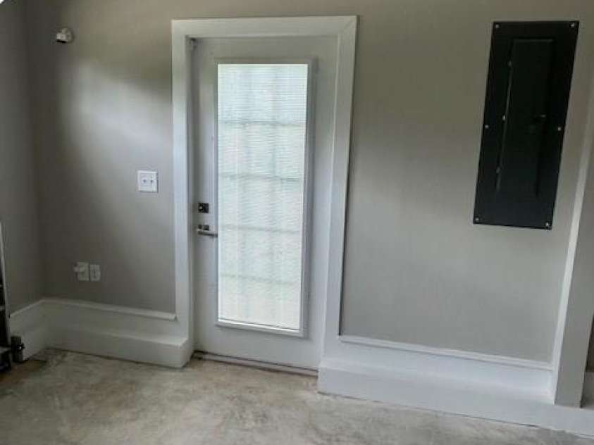 1411 Cottage Green Drive, Monroe, NC 28112.  MLS# CAR4275637, YatesRealty ID 22414. Garage entrance door