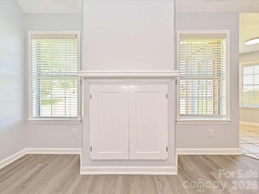 4922 Alexis Drive, Indian Trail, NC 28079.  MLS# CAR4382552, YatesRealty ID 22421. Fireplace Box filled with Cabinet