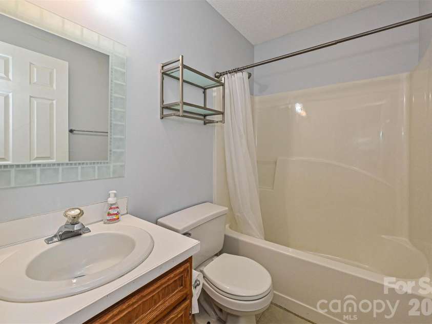 4922 Alexis Drive, Indian Trail, NC 28079.  MLS# CAR4382552, YatesRealty ID 22421. Main bathroom