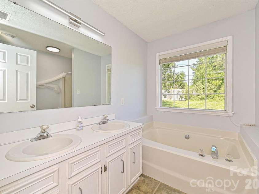 4922 Alexis Drive, Indian Trail, NC 28079.  MLS# CAR4382552, YatesRealty ID 22421. Primary Bathroom