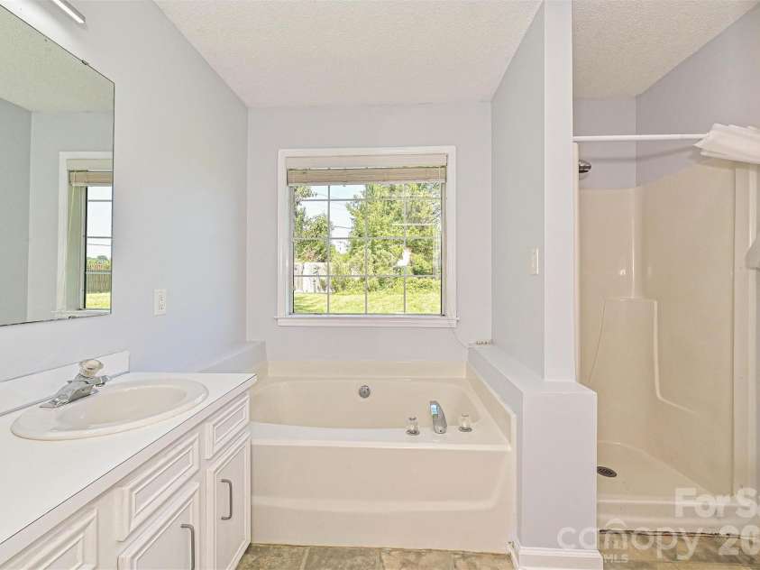 4922 Alexis Drive, Indian Trail, NC 28079.  MLS# CAR4382552, YatesRealty ID 22421. Primary Bathroom