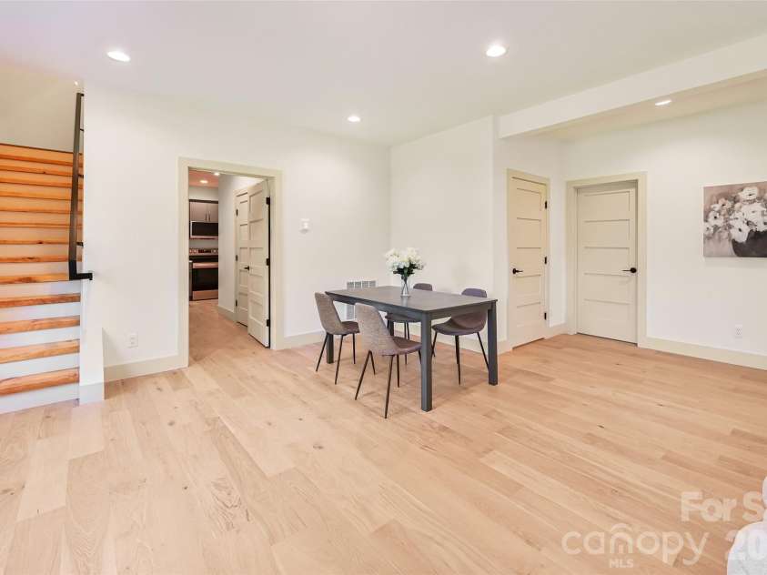 30 Sand Hill Road, Asheville, NC 28806.  MLS# CAR4382772, YatesRealty ID 22422. Basement dining area