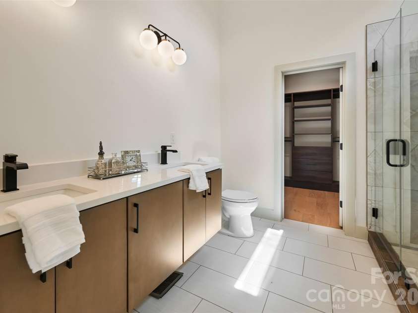 30 Sand Hill Road, Asheville, NC 28806.  MLS# CAR4382772, YatesRealty ID 22422. Double vanity with heated floors 