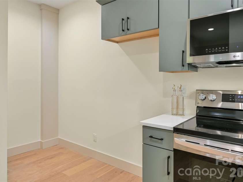 30 Sand Hill Road, Asheville, NC 28806.  MLS# CAR4382772, YatesRealty ID 22422. Flex space within kitchen and refrigerator slot