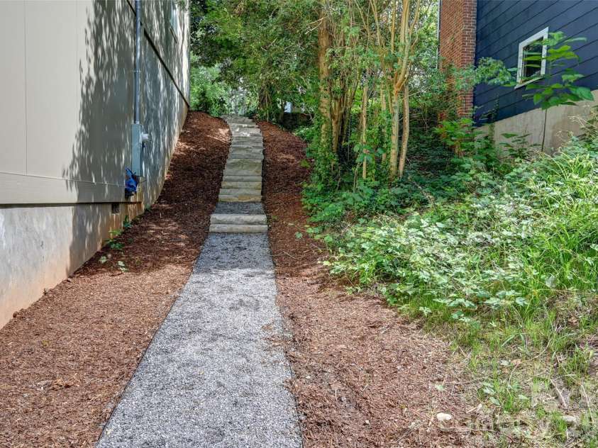 30 Sand Hill Road, Asheville, NC 28806.  MLS# CAR4382772, YatesRealty ID 22422. Lower level stairs from driveway