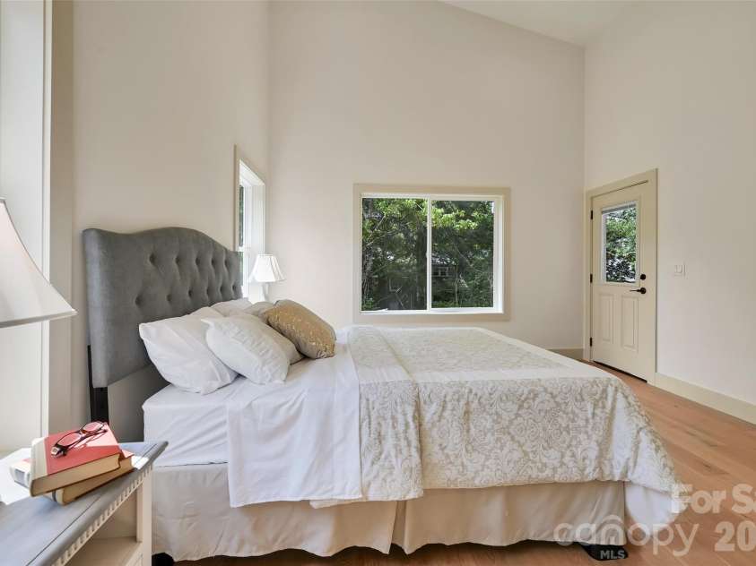 30 Sand Hill Road, Asheville, NC 28806.  MLS# CAR4382772, YatesRealty ID 22422. Main level primary with ensuite with deck access