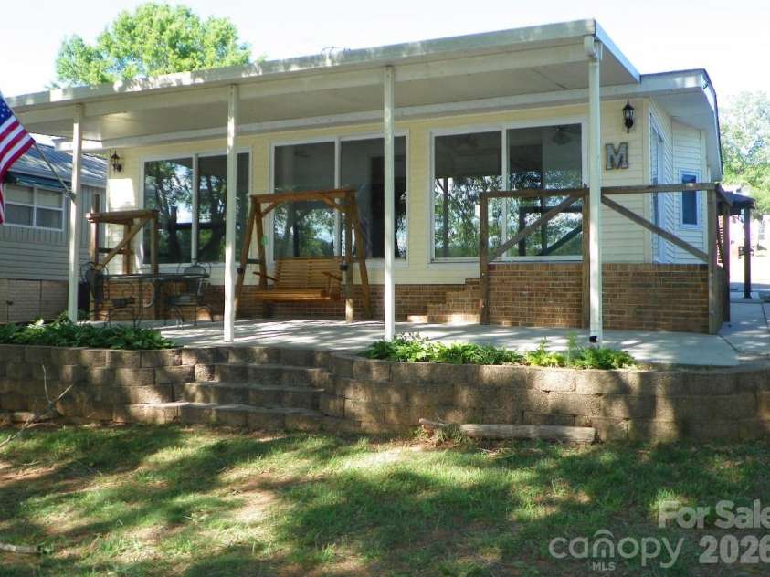 105 Dogwood Circle, New London, NC 28127.  MLS# CAR4382774, YatesRealty ID 22423. Lake side