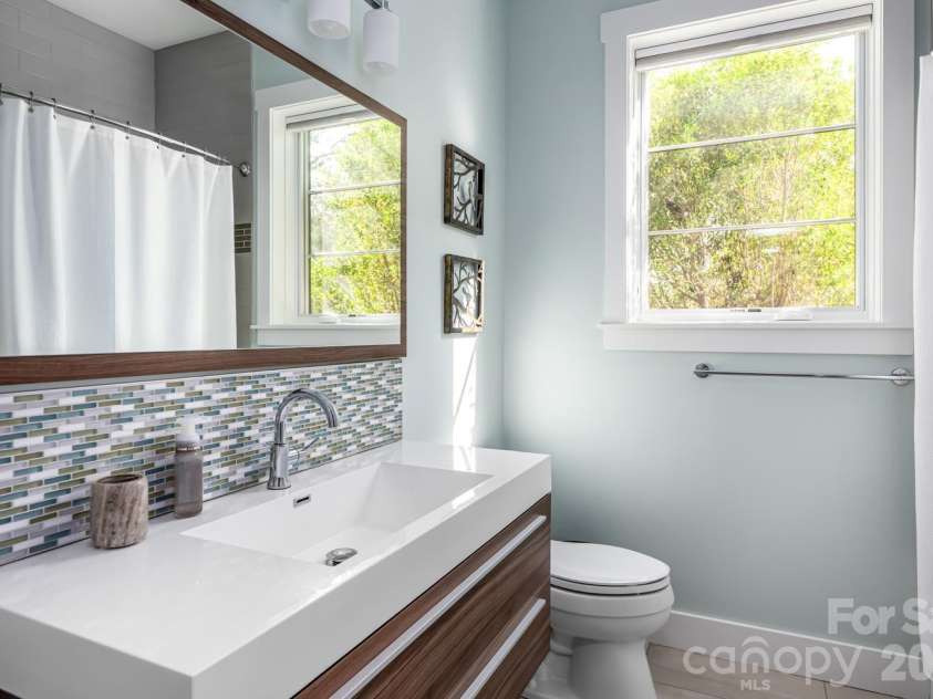 96 Gibson Road, Asheville, NC 28804.  MLS# CAR4346297, YatesRealty ID 22433. Lower Level Apartment Bath or 4th Bath