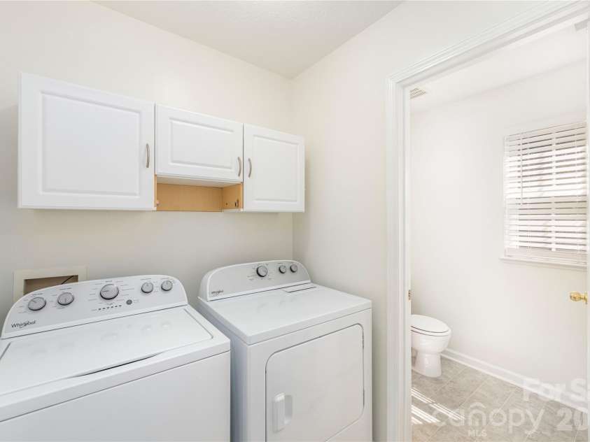 46 Chesire Way, Fletcher, NC 28732.  MLS# CAR4373703, YatesRealty ID 22434. Laundry room with half bath