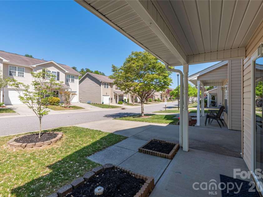 46 Chesire Way, Fletcher, NC 28732.  MLS# CAR4373703, YatesRealty ID 22434. Sit and enjoy your front porch