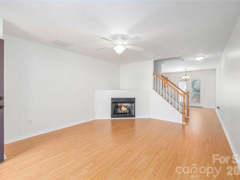 46 Chesire Way, Fletcher, NC 28732.  MLS# CAR4373703, YatesRealty ID 22434. Spacious living area with gas fireplace