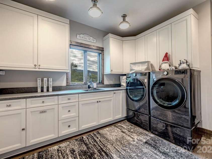 706 Silver Springs Drive, Banner Elk, NC 28604.  MLS# CAR4275009, YatesRealty ID 22440. Laundry