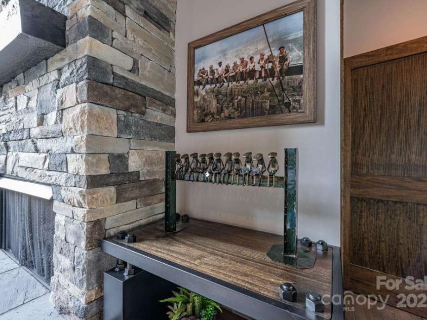 706 Silver Springs Drive, Banner Elk, NC 28604.  MLS# CAR4275009, YatesRealty ID 22440. Railroad Spike Art