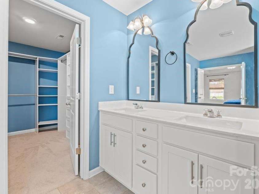 113 Lantern Acres Drive, Mooresville, NC 28115.  MLS# CAR4373088, YatesRealty ID 22443. Primary bath dual sinks