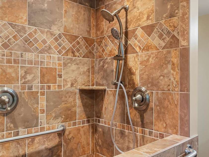 684 Woodfield Drive, Waynesville, NC 28786.  MLS# CAR4269678, YatesRealty ID 22443. Beautifully designed primary shower!