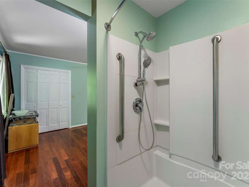 684 Woodfield Drive, Waynesville, NC 28786.  MLS# CAR4269678, YatesRealty ID 22443. Full bath in bedroom #3 w/ accessibility features