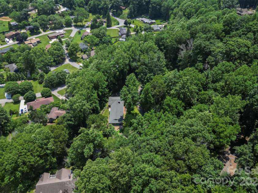 684 Woodfield Drive, Waynesville, NC 28786.  MLS# CAR4269678, YatesRealty ID 22443. Surrounding trees create wonderful privacy!