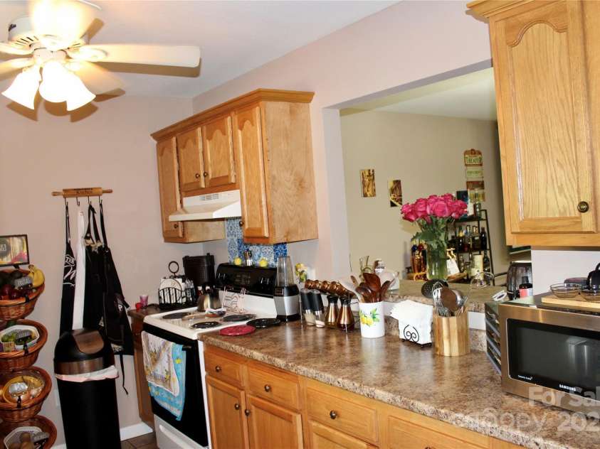 544 Tracy Grove Road, Flat Rock, NC 28731.  MLS# CAR4275855, YatesRealty ID 22446. Note: Interior photos are from adjacent duplex