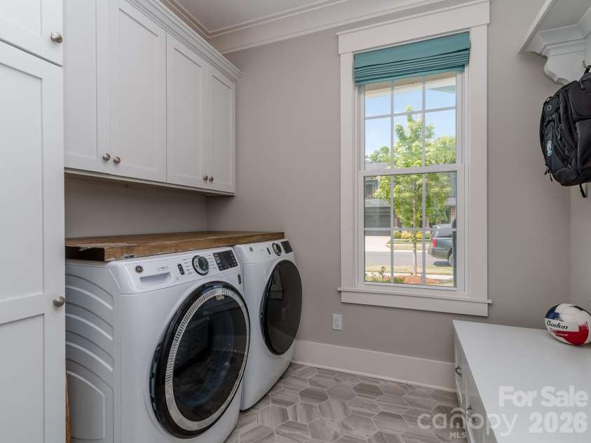 14124 Shelburne Village Drive, Charlotte, NC 28278.  MLS# CAR4363481, YatesRealty ID 22447. Laundry room 