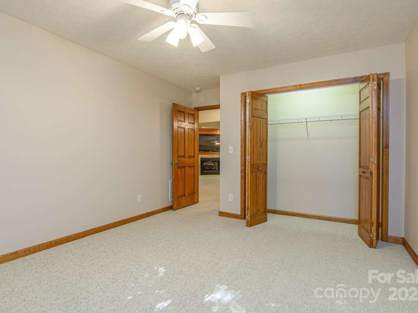 299 Carriage Summitt Way, Hendersonville, NC 28791.  MLS# CAR4305616, YatesRealty ID 22447. Lower Bedroom 2