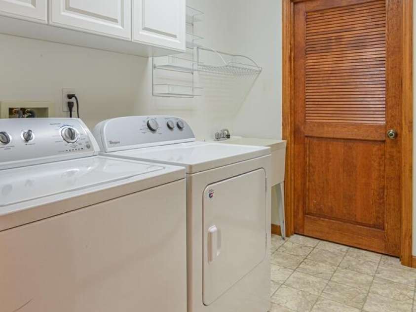 299 Carriage Summitt Way, Hendersonville, NC 28791.  MLS# CAR4305616, YatesRealty ID 22447. Lower Laundry Room