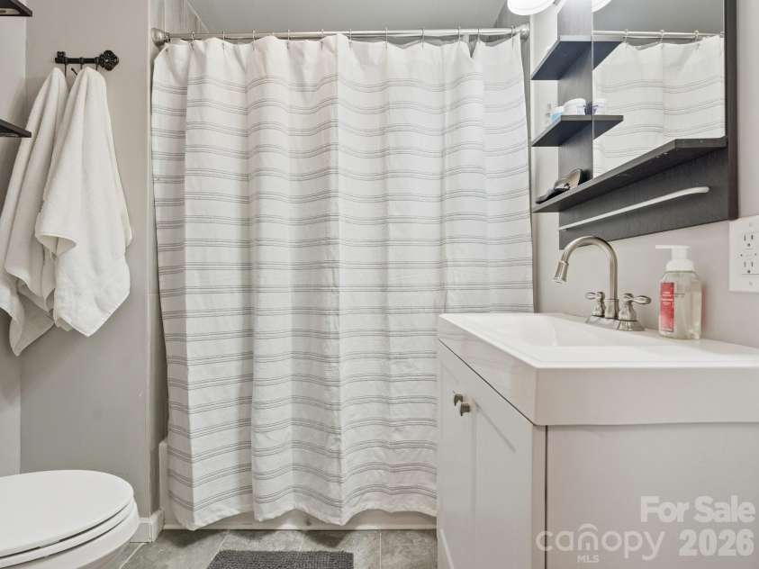 595 Gibson Drive, Concord, NC 28025.  MLS# CAR4336077, YatesRealty ID 2245. Bathroom 