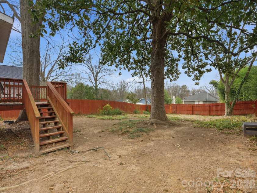 595 Gibson Drive, Concord, NC 28025.  MLS# CAR4336077, YatesRealty ID 2245. Fully Fenced Yard