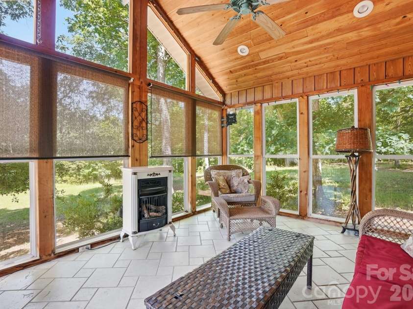 846 Windy Oaks Way, Van Wyck, SC 29720.  MLS# CAR4372947, YatesRealty ID 22450. Sun room 