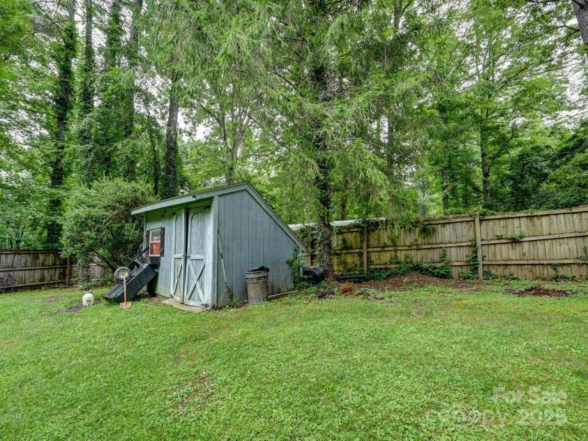 3221 Debbie Drive, Hendersonville, NC 28791.  MLS# CAR4255457, YatesRealty ID 22453. Extra Shed for Storage