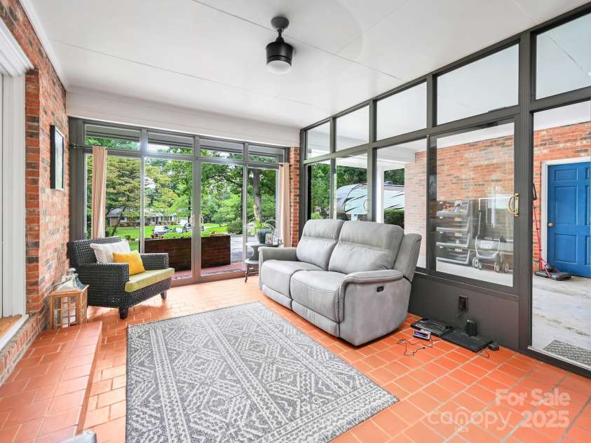 3221 Debbie Drive, Hendersonville, NC 28791.  MLS# CAR4255457, YatesRealty ID 22453. Second View of the Sunroom