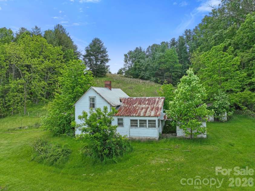 52 Will Smith Lane, Leicester, NC 28748.  MLS# CAR4379317, YatesRealty ID 22454. 1920's Farmhouse