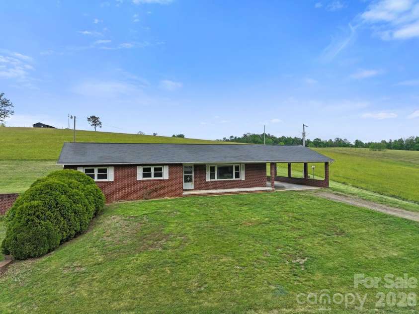 52 Will Smith Lane, Leicester, NC 28748.  MLS# CAR4379317, YatesRealty ID 22454. A few neighbors but the property feels private.