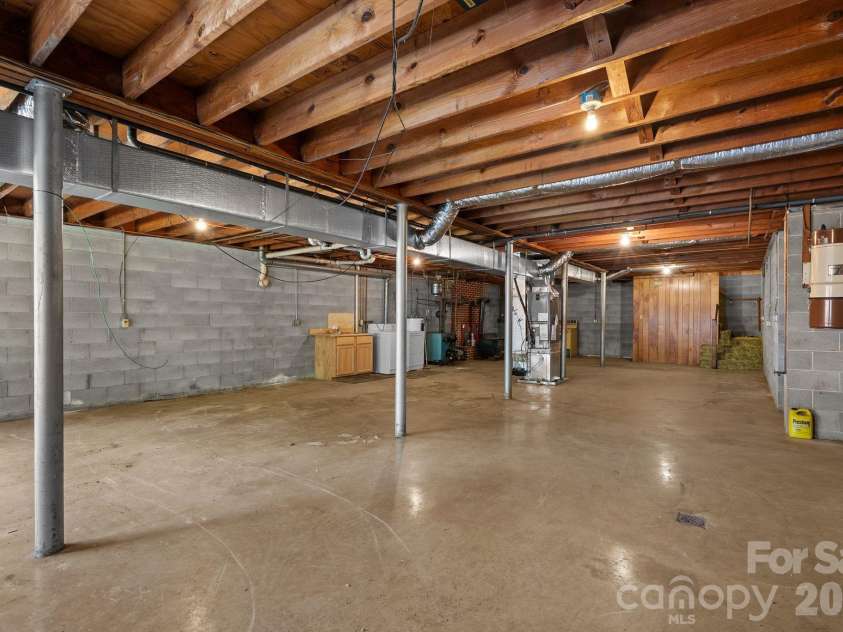 52 Will Smith Lane, Leicester, NC 28748.  MLS# CAR4379317, YatesRealty ID 22454. Basement