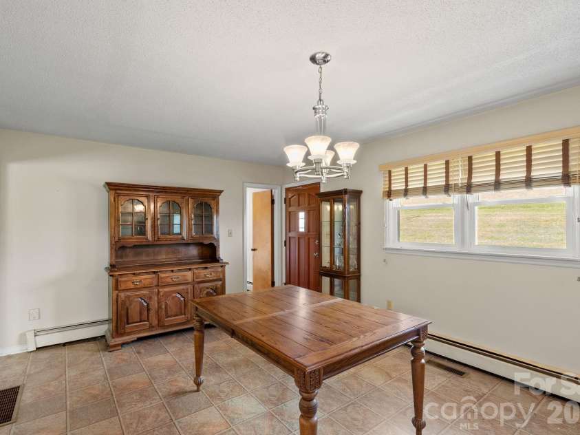 52 Will Smith Lane, Leicester, NC 28748.  MLS# CAR4379317, YatesRealty ID 22454. Door to Back Yard