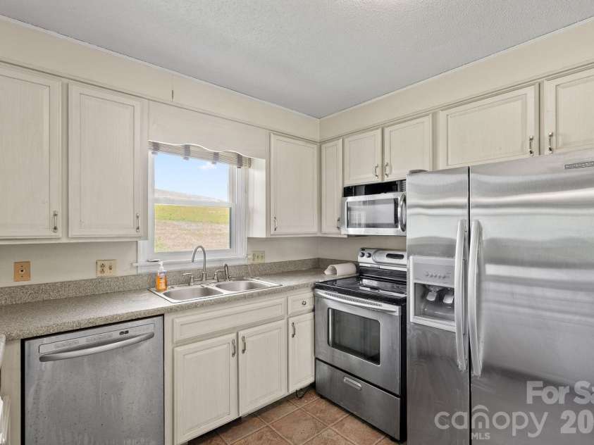 52 Will Smith Lane, Leicester, NC 28748.  MLS# CAR4379317, YatesRealty ID 22454. Kitchen 