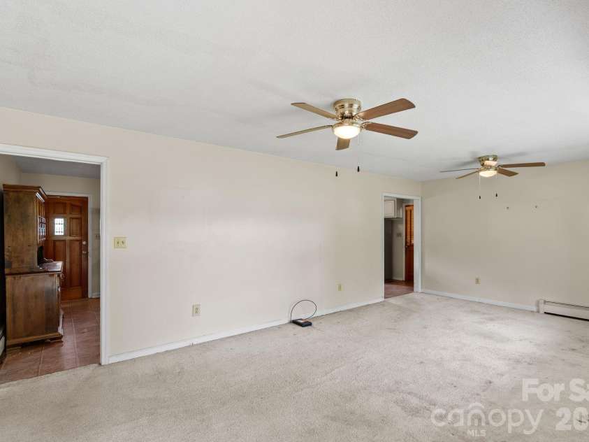 52 Will Smith Lane, Leicester, NC 28748.  MLS# CAR4379317, YatesRealty ID 22454. Living Room