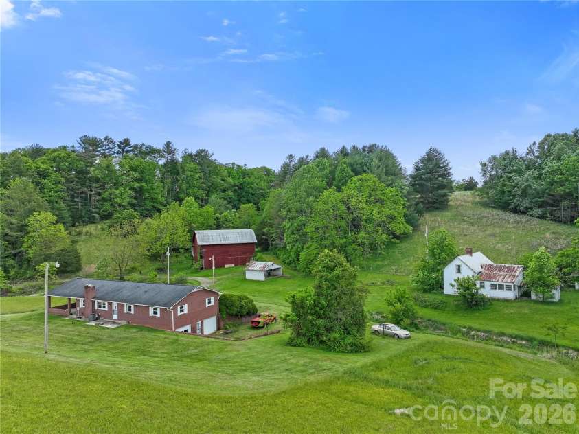 52 Will Smith Lane, Leicester, NC 28748.  MLS# CAR4379317, YatesRealty ID 22454. Lots of land space.