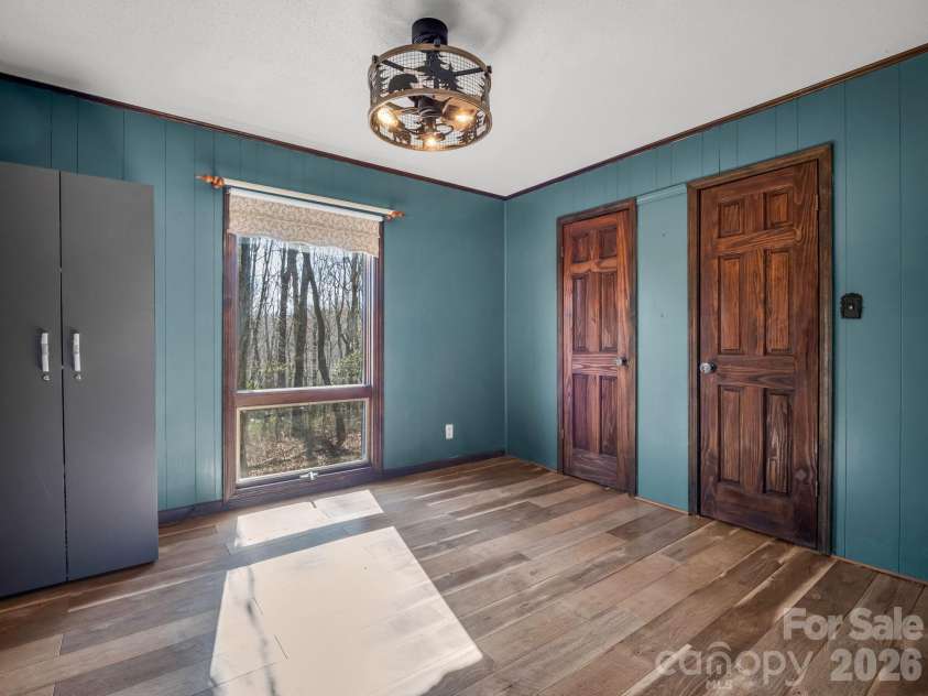 177 Tsisqua Circle, Brevard, NC 28712.  MLS# CAR4341526, YatesRealty ID 22465. Bedroom and half bathroom