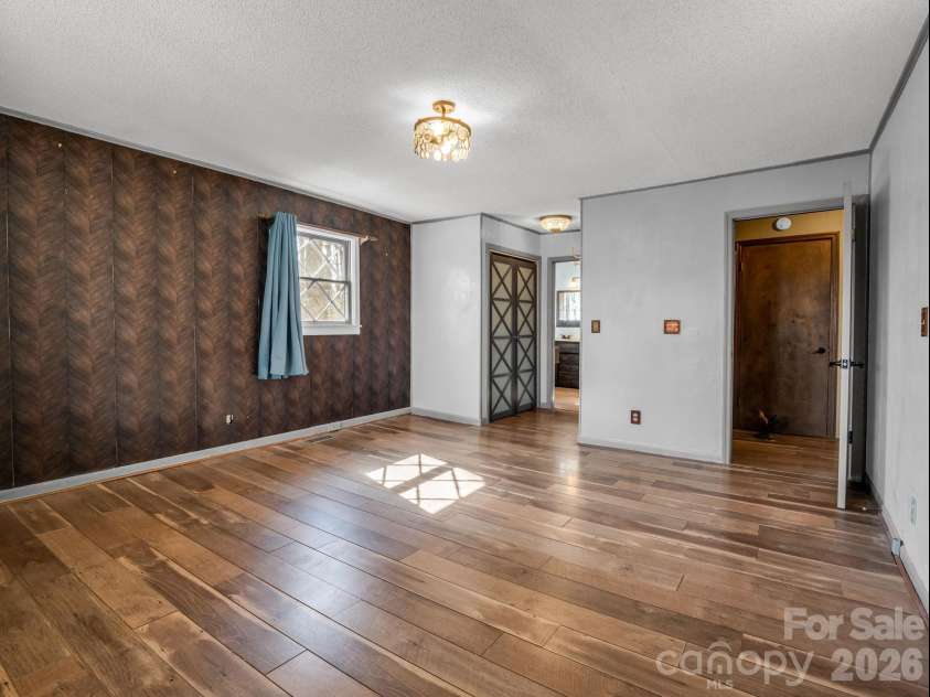 177 Tsisqua Circle, Brevard, NC 28712.  MLS# CAR4341526, YatesRealty ID 22465. Primary bedroom