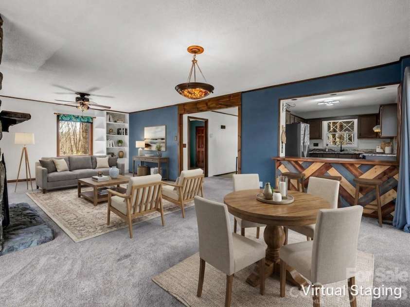177 Tsisqua Circle, Brevard, NC 28712.  MLS# CAR4341526, YatesRealty ID 22465. Virtually Staged dining and living room