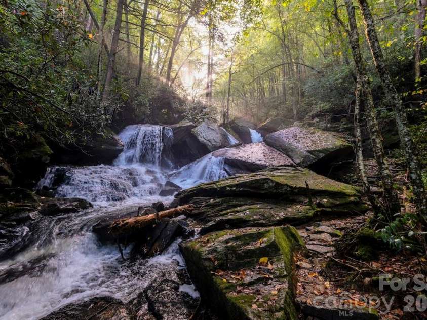 177 Tsisqua Circle, Brevard, NC 28712.  MLS# CAR4341526, YatesRealty ID 22465. Waterfall on the amakola trail